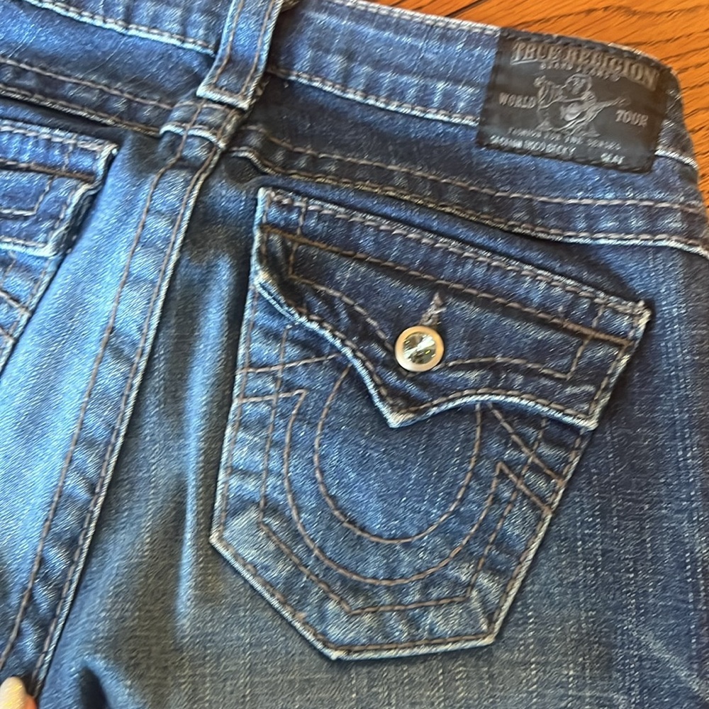 True Religion, brand jeans, made in USA of imported fabric. Size 26